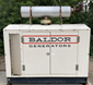 97 kw Baldor / GM (Enclosed, 8.1L GM V8, 301 Hours, Mfg. 2003) Natural Gas/LP Genset